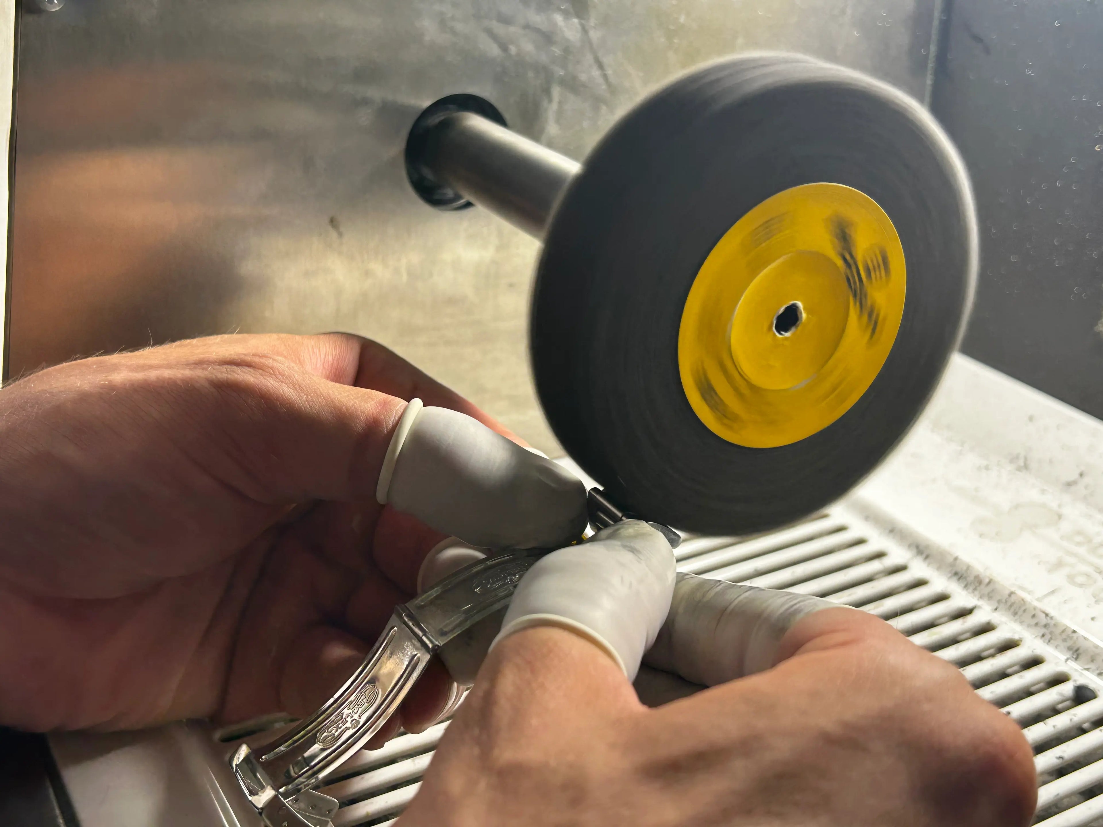 Filing away excess material from a laser welded element.