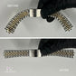 Before and after comparison of a Rolex Jubilee watch bracelet restoration with Marmer Watches logo.